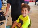 Future amateur radio operators 10-year-old Michael Jones and his 12-year-old brother Zaydin (yellow shirt), grandchildren of April MacMurray, WU2BBY. [Photo courtesy of Ed Wilson, N2XDD]